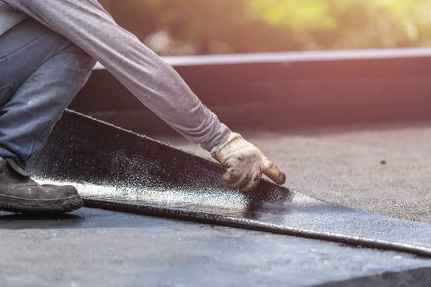 Professional Emergency Waterproofing technician working in Lawrence, KS